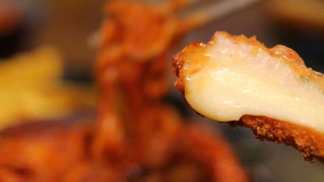 Crispy cheese pork cutlet with spicy sauce with bean sprouts