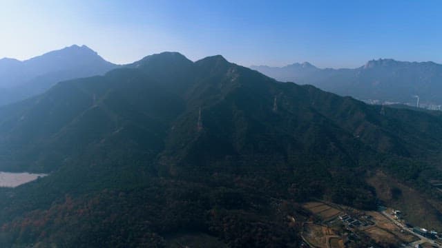 Mountainous Terrain with Electrical Towers