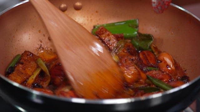 Stir-fried Sausage and Mushrooms Cooked in a Pan