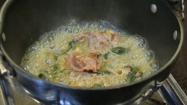 Beef shabu-shabu boiling in a pot