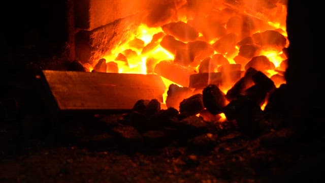 Firewood burning in a fireplace