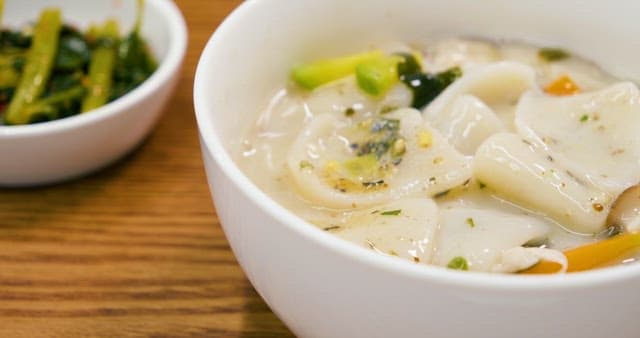 Steaming Rice Cake Soup in a Bowl