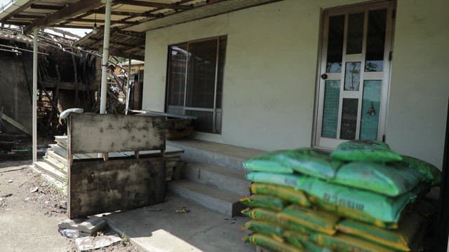 Dilapidated Old House in a Suburban Area