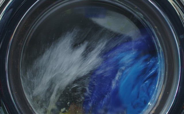 Drum washing machine running with laundry loaded