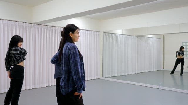 K-POP Dancers Practicing in a Studio