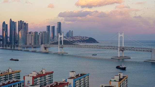 Busan Gwangan Bridge scenery as the sun sets and night falls