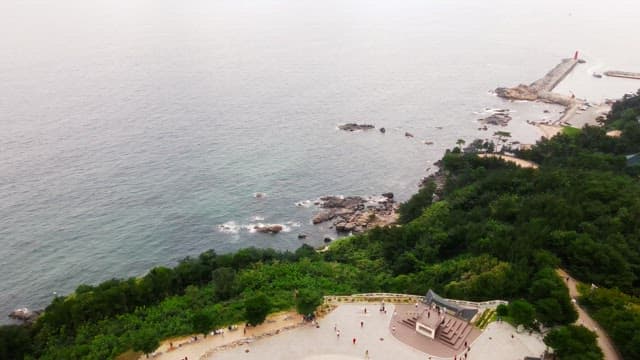 Lush greenery and blue sea around the temple