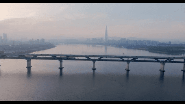 Bridge over river with subway and cars
