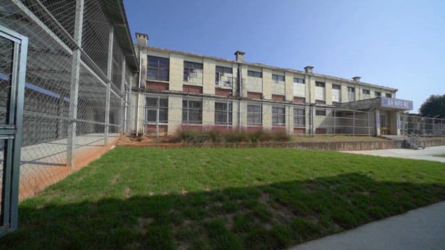 Peaceful Prison Yard under clear skies