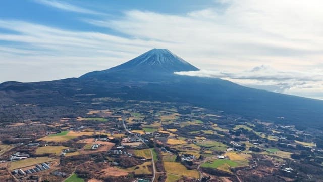 Majestic Mount Fuji with surrounding fields