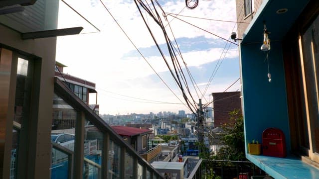 View of a city street with power lines