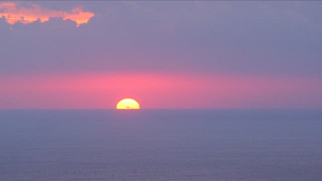 Serene Sunset Over Calm Sea
