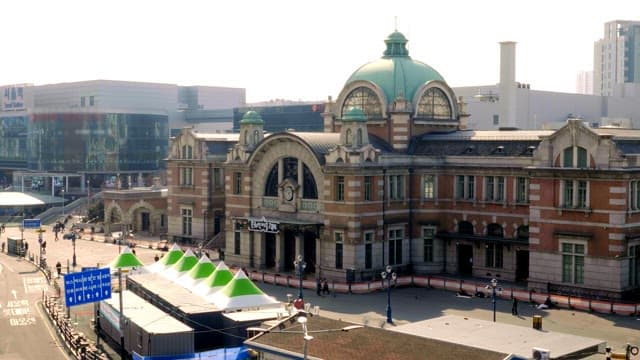 Midday view of Seoul Station with people walking