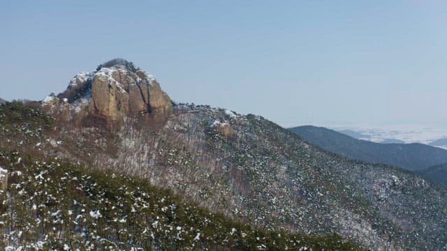 Snow-covered mountain landscape on a clear day