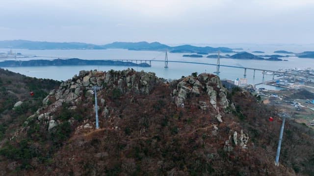 Scenic view of a bridge and mountains