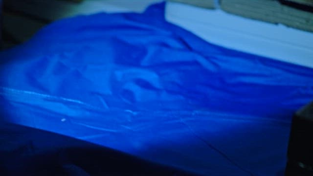 Close-up shots of a secret cash stash