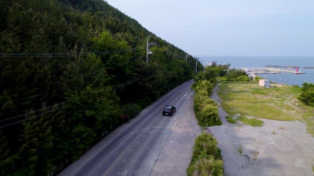 Beautiful Coastal Road with Tranquil East Sea