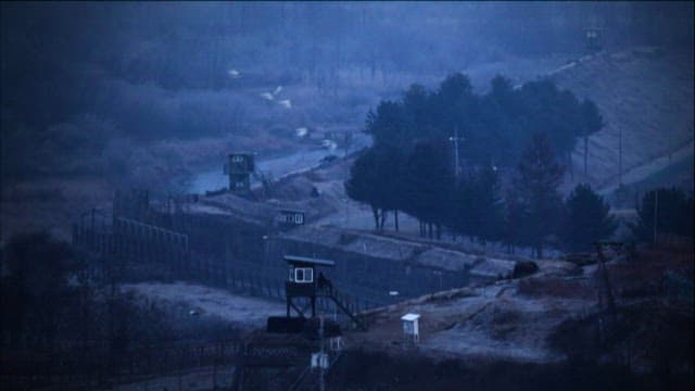 Quiet demilitarized zone scene at dawn