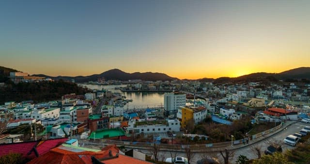 Scenery from evening to night of a busy port city