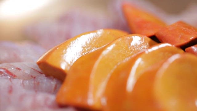 Sliced fish and liver of it on a plate