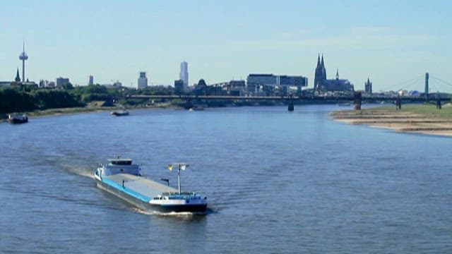 Cargo ship crossing the river