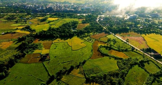 Aerial view of rural landscape at sunrise