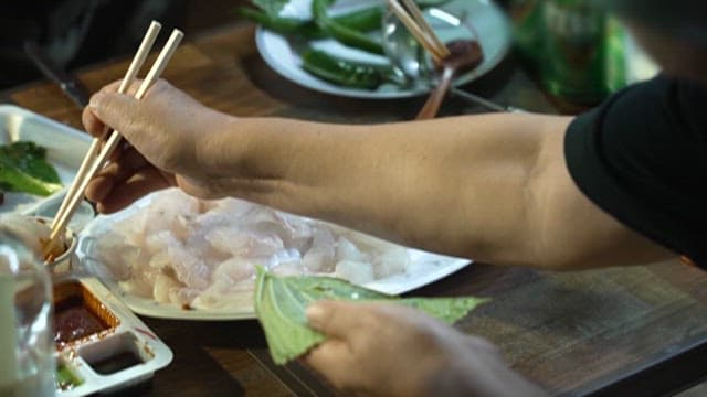 Fresh Raw Fish Wrapped in Sesame Leaf