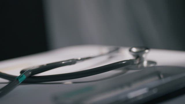 Focus on Stethoscope on White Medical Table