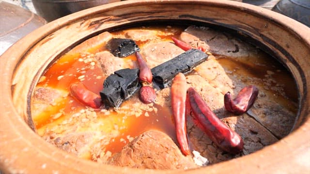 Traditional Korean Fermented Soybean Paste in a Large Jar
