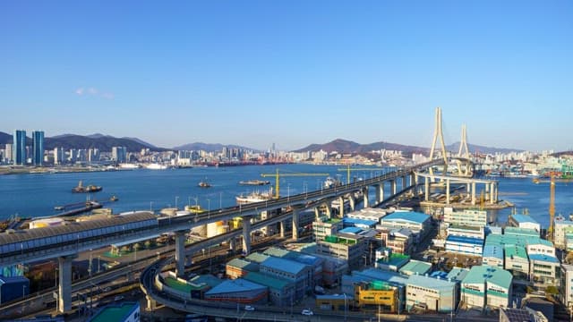 Busy Busanhangdaegyo Bridge from day to night