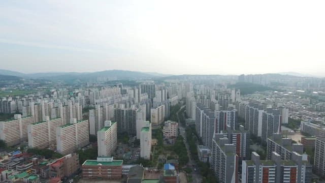 Densely populated urban area with high-rise apartment buildings during the day