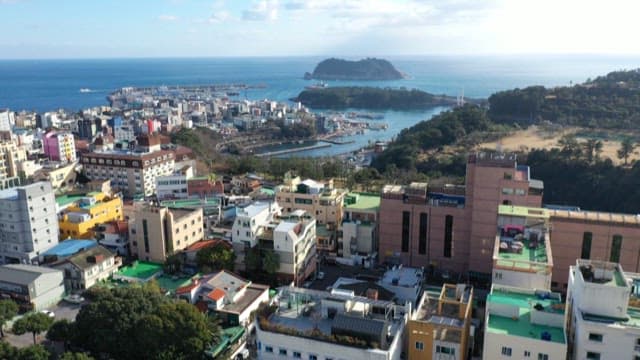 Cityscape with many buildings near the sea