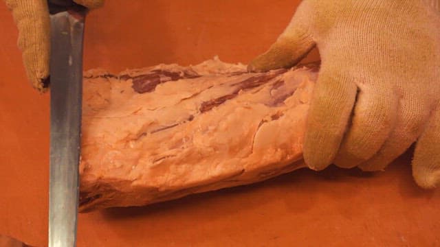 Cutting Meat on a Cutting Board