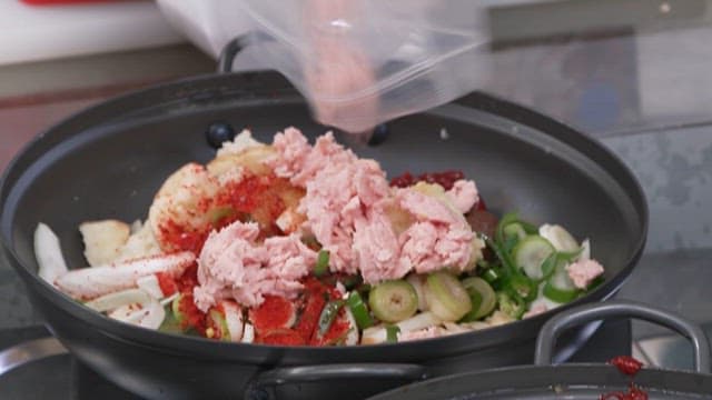 Add the Chopped Ham to the Pan Mixed with Vegetables and Red Pepper Powder