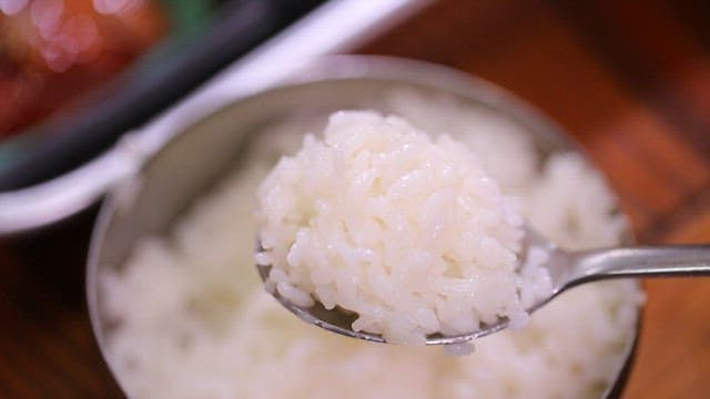 Spoonful of rice with salted guts of hairtail