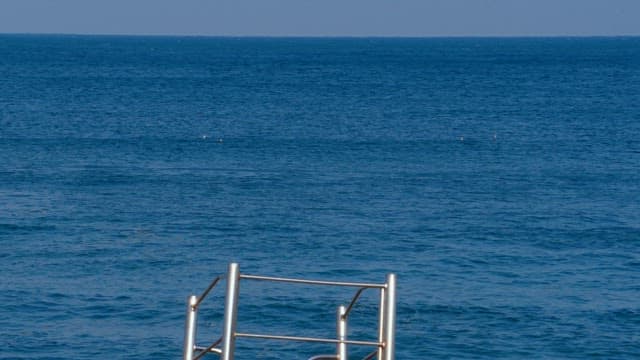 View of a blue sea with gentle waves