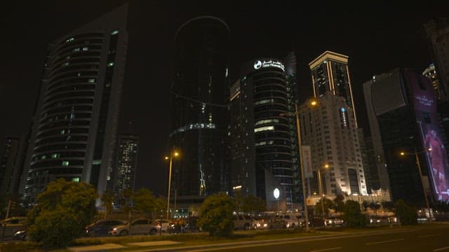 Bustling City Night with Glowing Skyscrapers