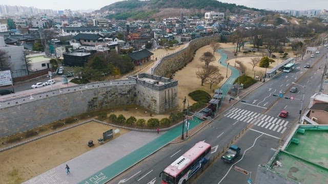 Traditional Korean wall in the middle of the city on a cloudy day
