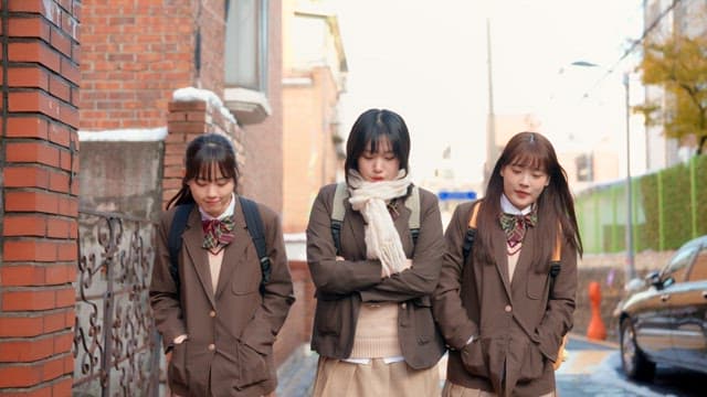 Students walking on the street in winter