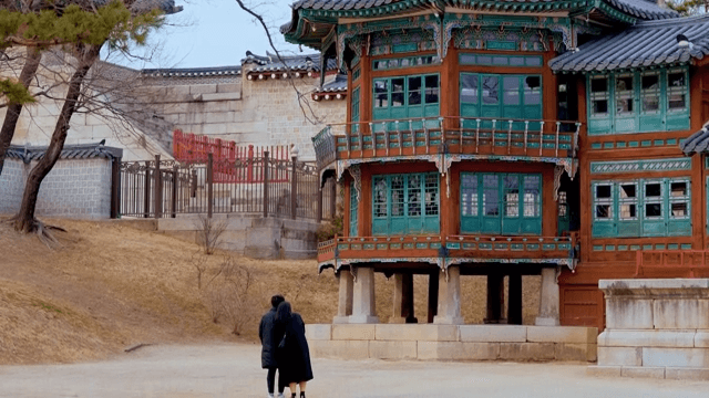 Couple near a traditional Korean building