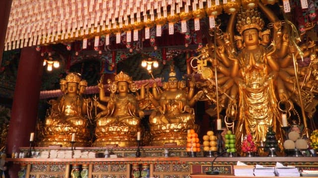 Golden Buddhist statues in a temple