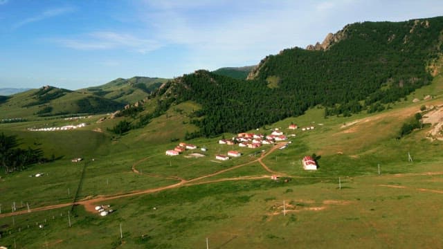 Village nestled in green hills