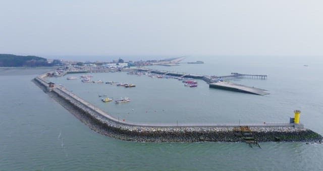 Coastal harbor with boats and piers