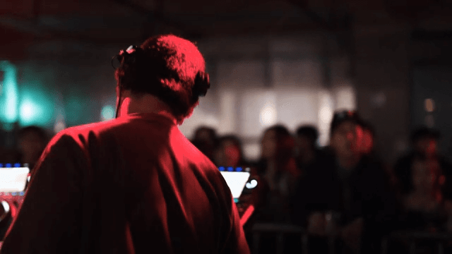 DJ Communicating with the Audience in the Club