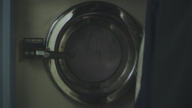 Industrial washing machine spinning its contents