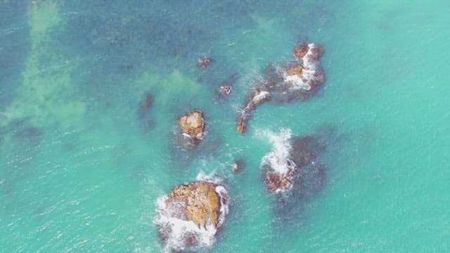 View of a rocky coastline and clear sea