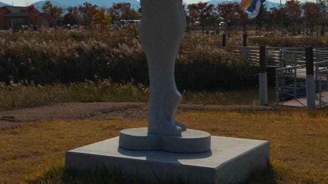 Statues Amongst Autumn Scenery