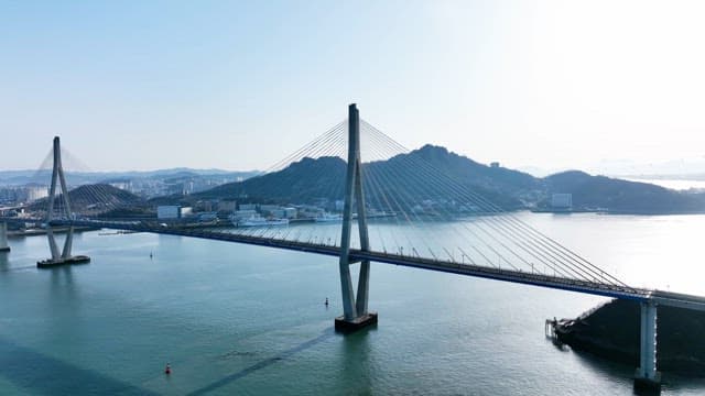Large bridge over a calm blue sea