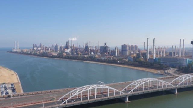 Aerial View of Industrial Complex and Coastal Bridge