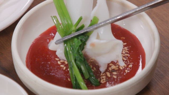 Webfoot Octopus and Water Parsley Dipped in Red Chili-Pepper Paste with Vinegar